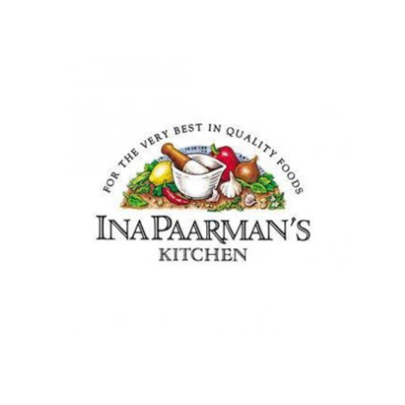 Ina Paarman's Kitchen logo featuring an illustration of fresh ingredients like garlic, onions, peppers, and herbs in a mortar and pestle, with the text 'FOR THE VERY BEST IN QUALITY FOODS' and 'INA PAARMAN'S KITCHEN' below on a white background.